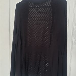 Black cardigan with intricate back design